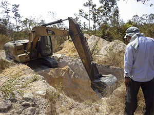 photo02: Photo of digging a hole in the ground with a power shovel