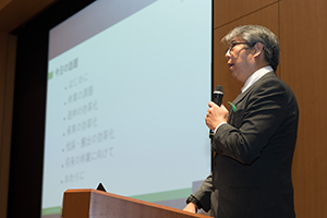講演中の壁谷大介チーム長
